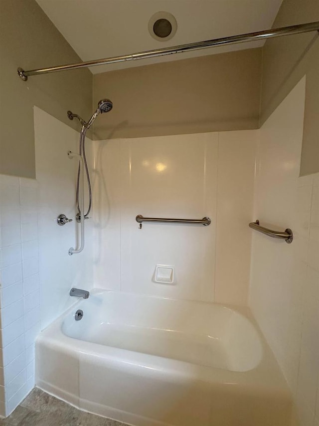 bathroom with shower / tub combination