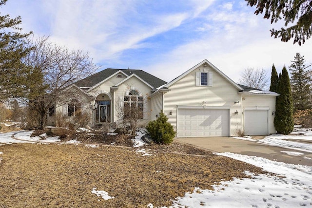 view of front facade featuring a garage and concrete driveway