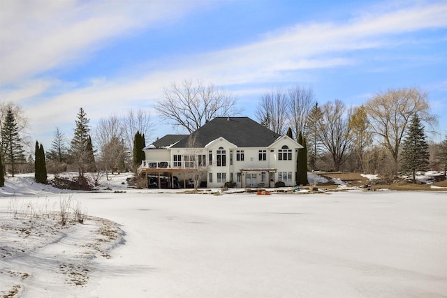 view of snow covered property