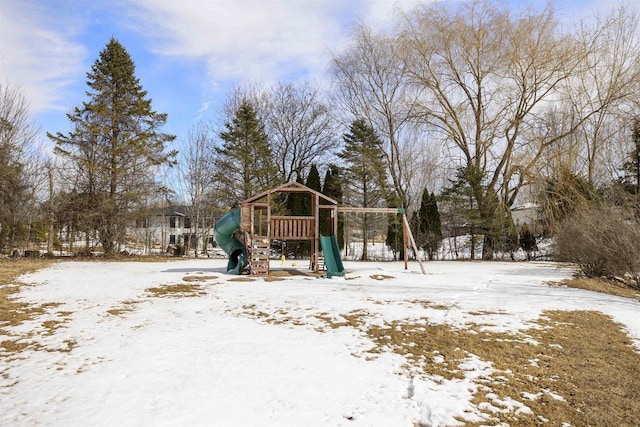 snow covered playground featuring playground community