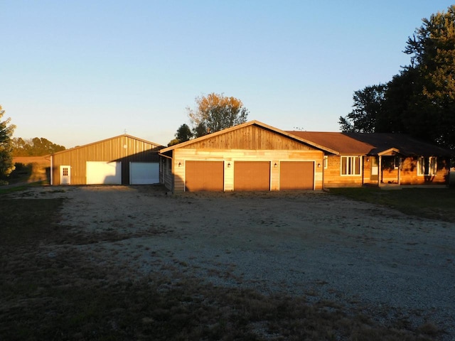 view of front of house with an attached garage and driveway