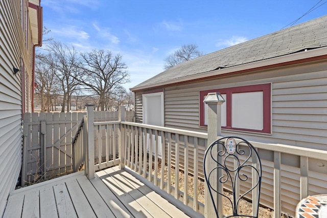 wooden deck featuring fence