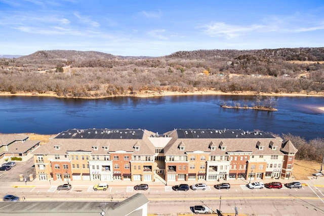 birds eye view of property featuring a water view