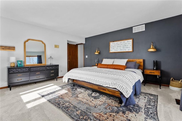 bedroom featuring carpet flooring, baseboards, and visible vents