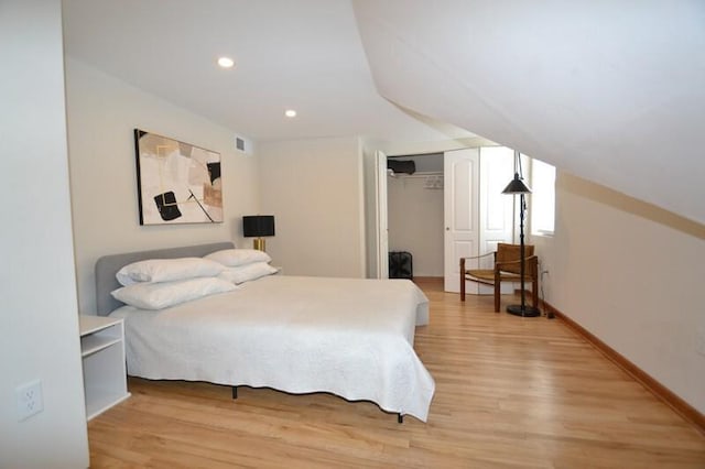 bedroom featuring visible vents, recessed lighting, a closet, light wood finished floors, and baseboards