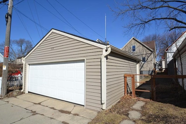 detached garage with fence