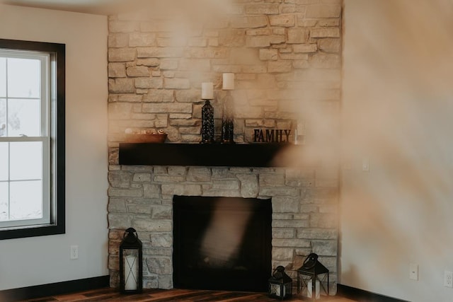 details featuring a stone fireplace