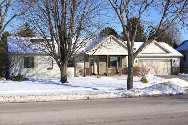 ranch-style home featuring a garage and driveway