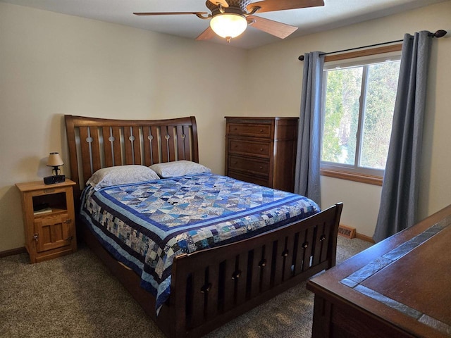 bedroom featuring baseboards, carpet, and a ceiling fan