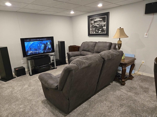 living area featuring carpet flooring, recessed lighting, baseboards, and a drop ceiling