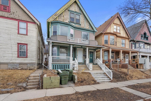 victorian-style house featuring covered porch