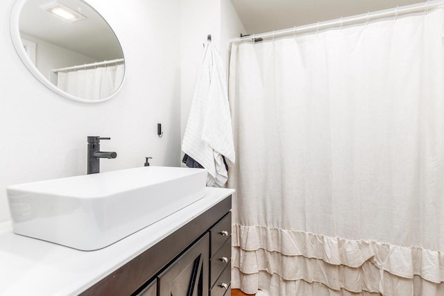 full bathroom featuring vanity