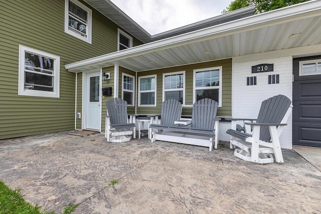 view of patio / terrace featuring a garage