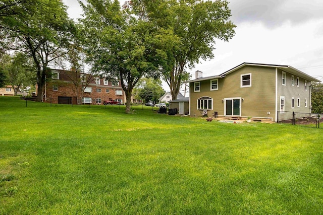 view of yard with fence