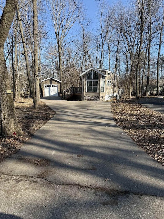 view of road with aphalt driveway