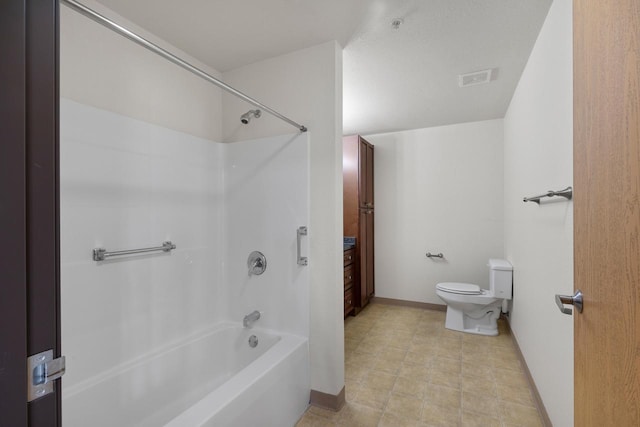 bathroom featuring visible vents, baseboards, toilet, and washtub / shower combination