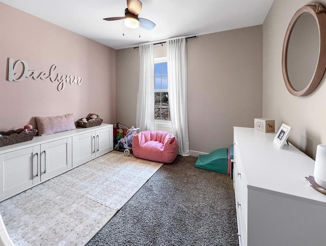 bedroom with light colored carpet and ceiling fan