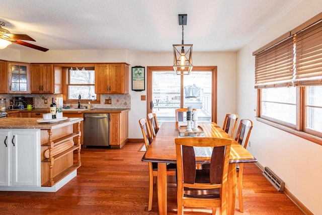 interior space featuring baseboards, visible vents, and light wood finished floors