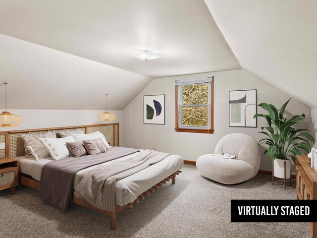 carpeted bedroom featuring vaulted ceiling and baseboards