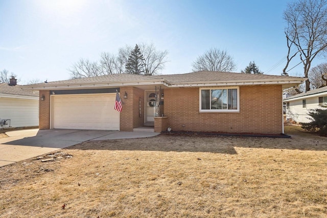 single story home with brick siding, driveway, a front lawn, and a garage