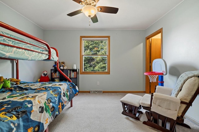 bedroom with visible vents, baseboards, a ceiling fan, and carpet flooring