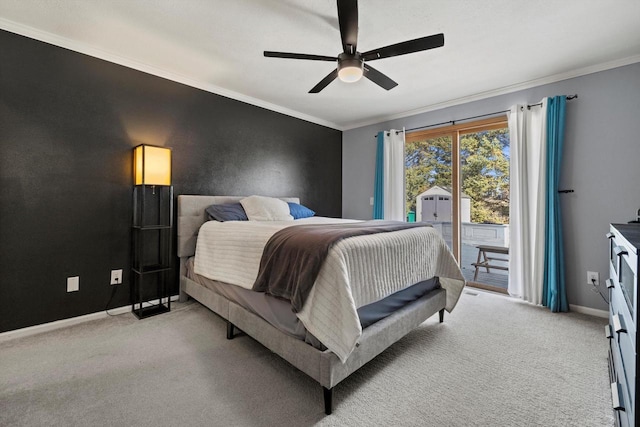 bedroom featuring baseboards, carpet, ornamental molding, and access to outside