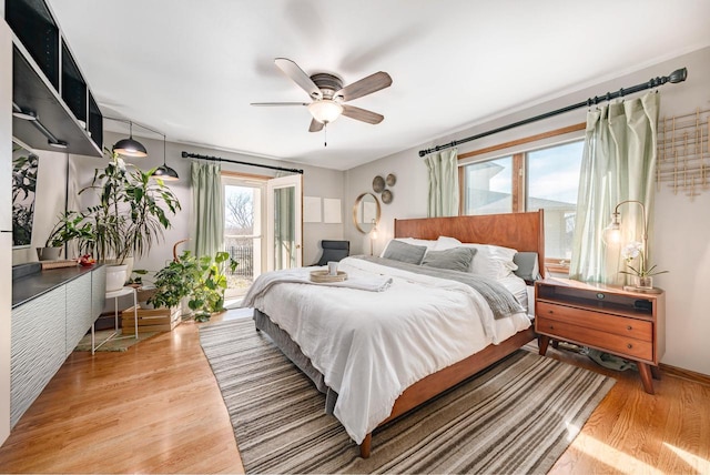 bedroom featuring ceiling fan and wood finished floors