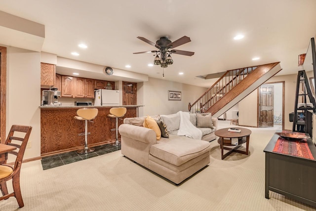 living room featuring stairway, carpet flooring, recessed lighting, and ceiling fan