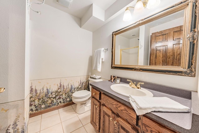 full bath with tile patterned flooring, visible vents, toilet, vanity, and a shower