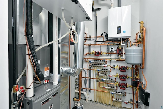 utility room with tankless water heater