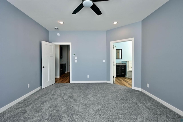 unfurnished bedroom with carpet flooring, recessed lighting, ensuite bath, and baseboards