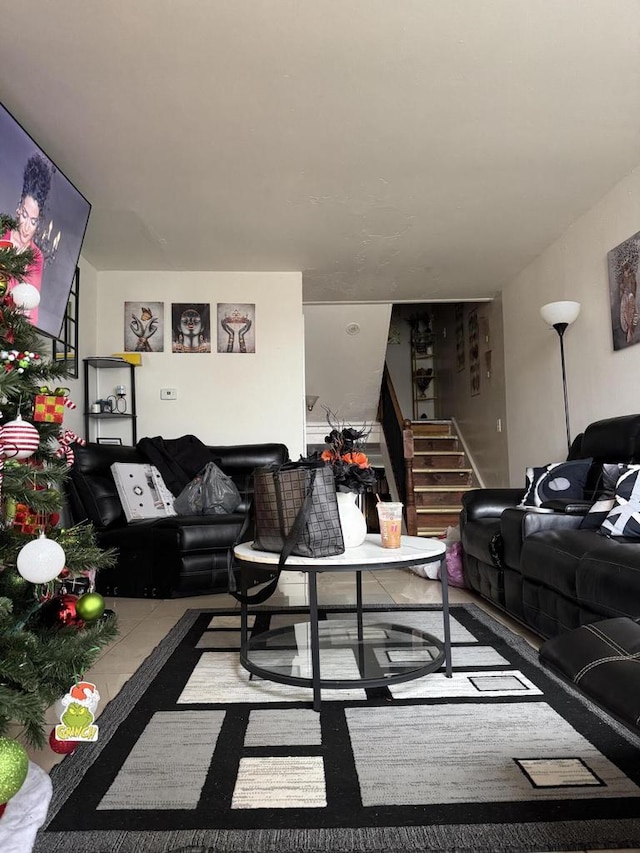 living room featuring stairs