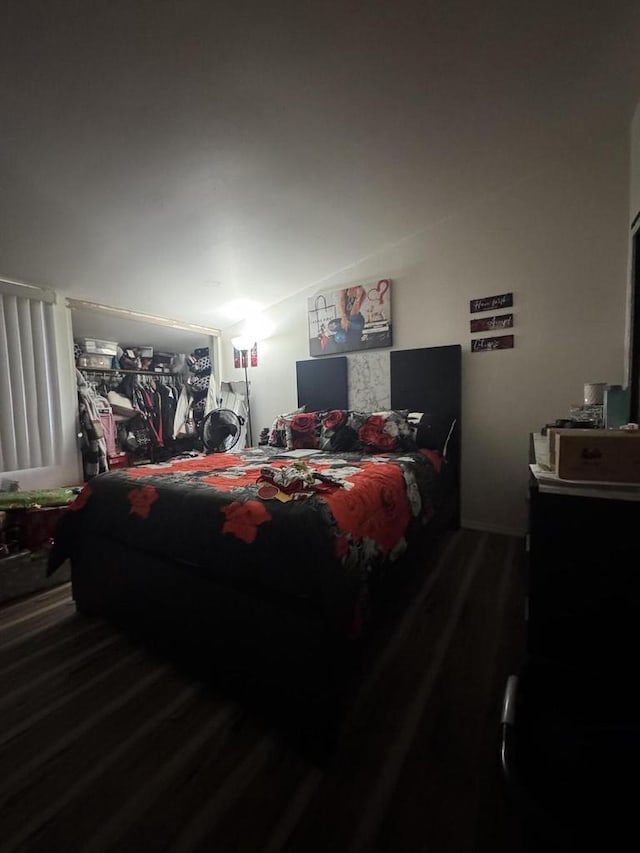 bedroom with wood finished floors