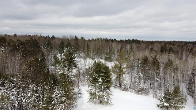 view of landscape with a view of trees