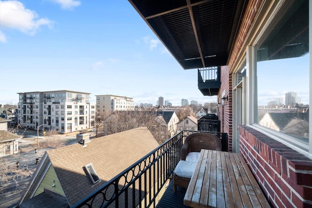 balcony featuring a city view