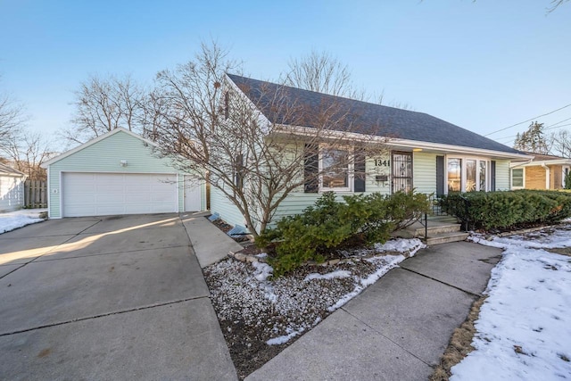 single story home featuring roof with shingles and an outdoor structure