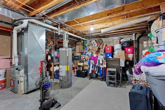 unfinished basement featuring water heater and heating unit