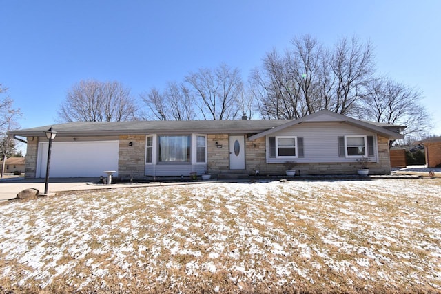 ranch-style house with concrete driveway, an attached garage, and stone siding