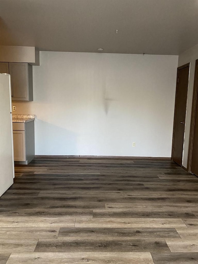 interior space with dark wood-type flooring