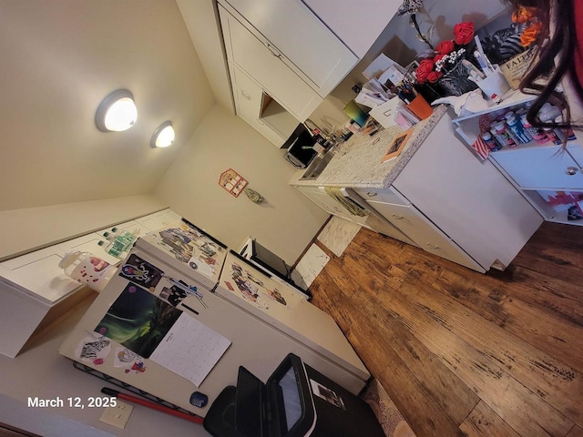 kitchen featuring wood finished floors