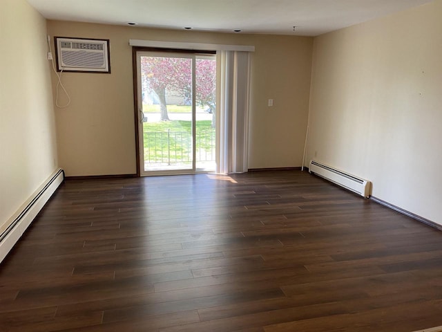 unfurnished room with a baseboard radiator, dark wood finished floors, and a wall mounted AC