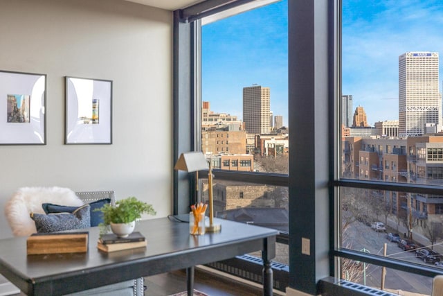 home office with a city view and expansive windows