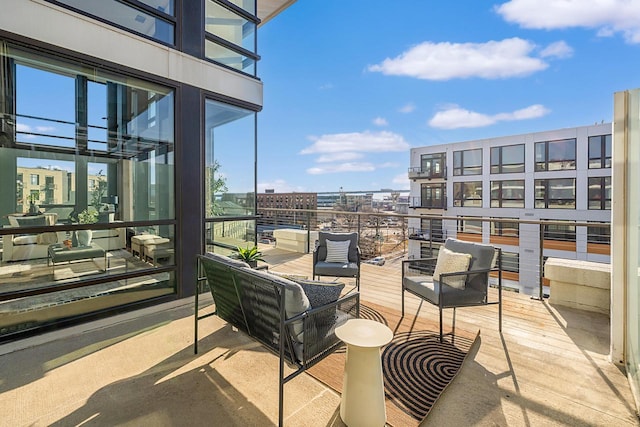 view of patio featuring a balcony