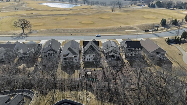 aerial view with view of golf course and a residential view