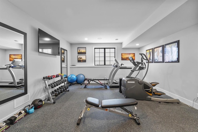 exercise area with visible vents, recessed lighting, and baseboards