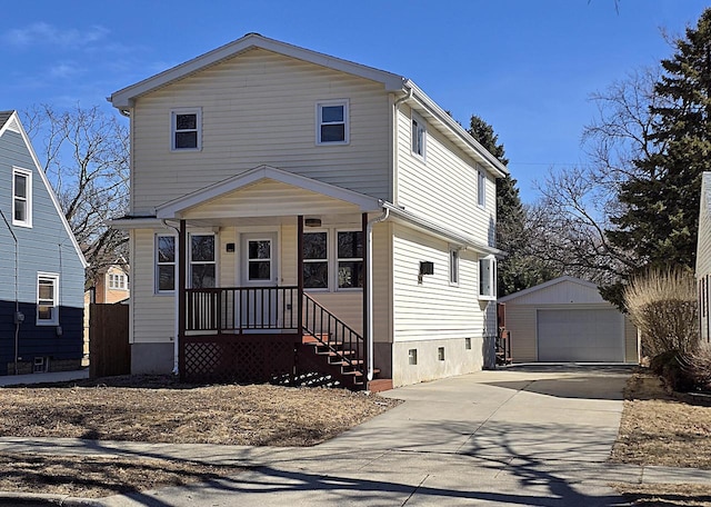 view of front of home featuring an outbuilding, driveway, and a garage