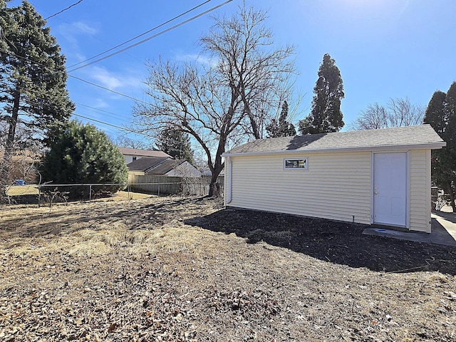 garage with fence