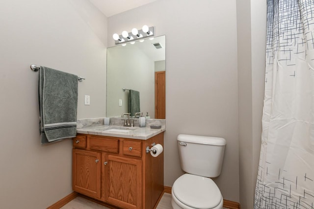 bathroom with visible vents, baseboards, toilet, and vanity