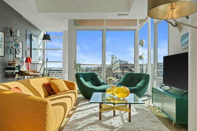 sunroom / solarium featuring visible vents