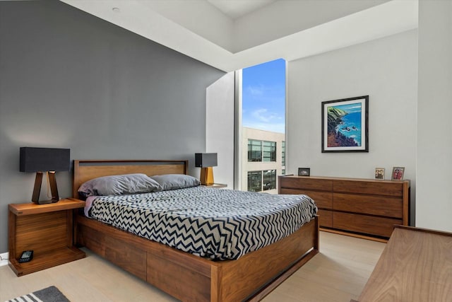 bedroom featuring light wood-type flooring